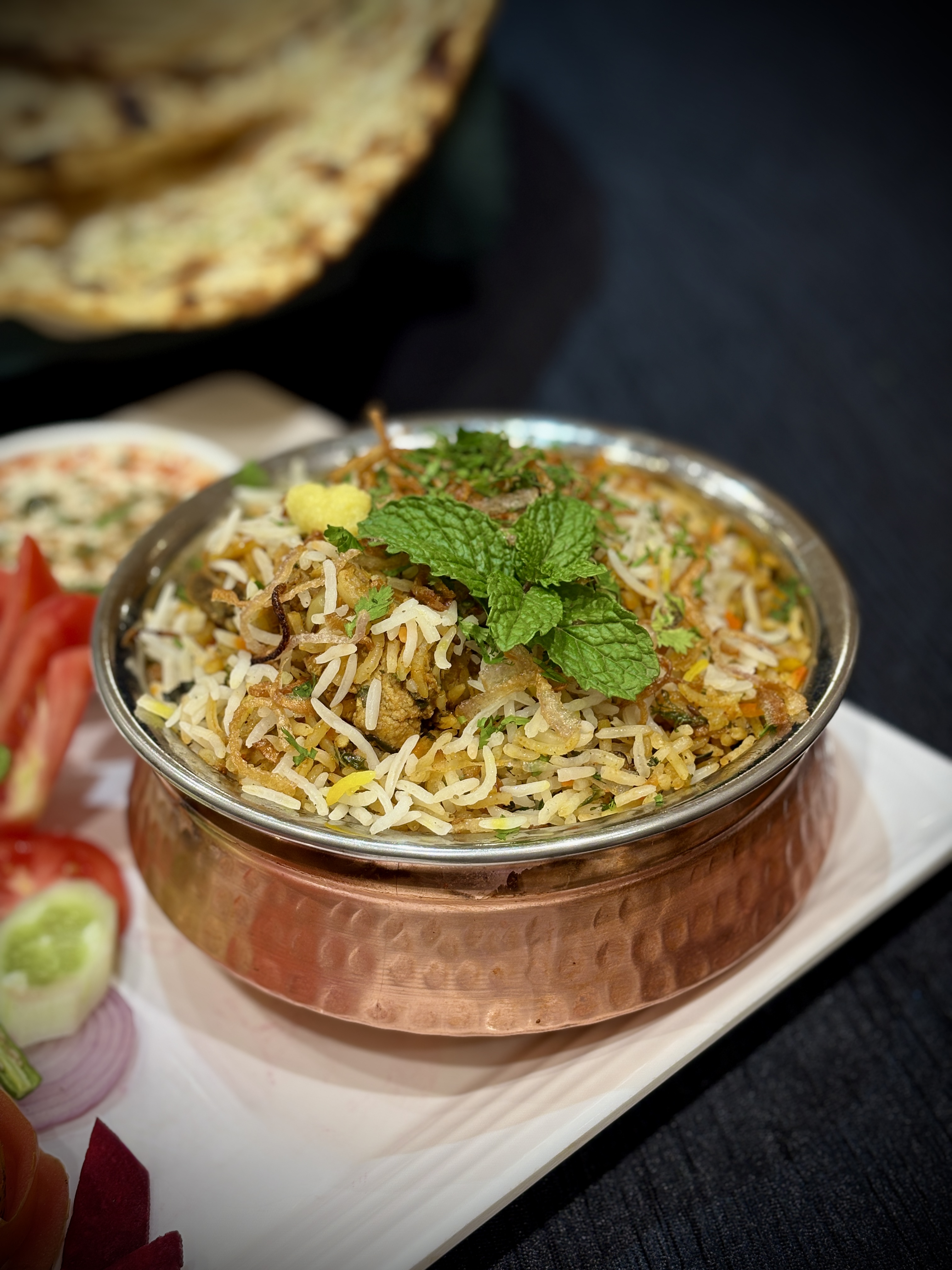 Biryani in a copper bowl