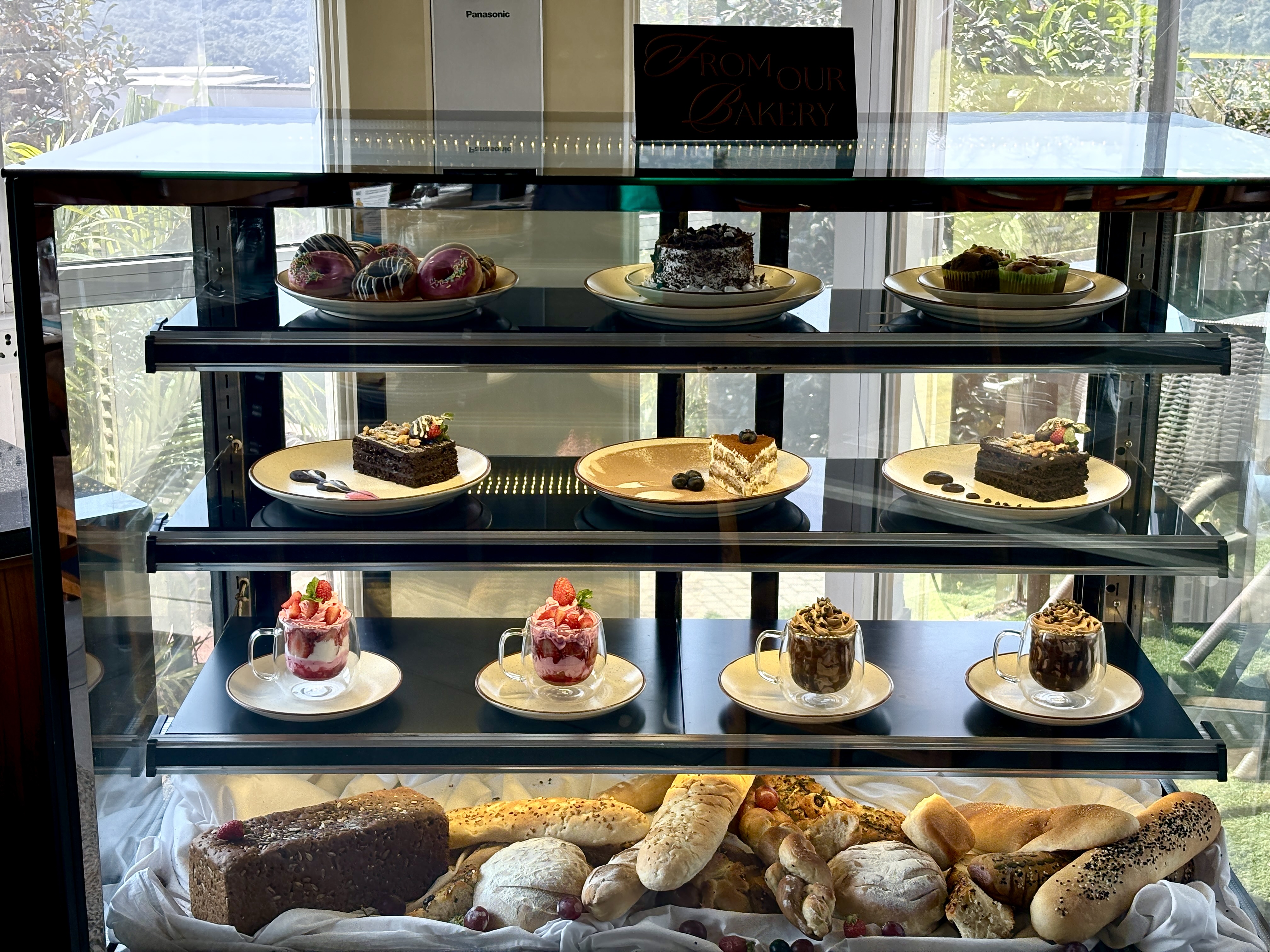 Bakery display — cakes, breads and pastries
